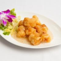 Honey Walnut Shrimp · 8 giant prawns stuffed with whole walnuts and glazed in a subtle honey sauce.