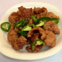 Salted Pepper Pork Chop · Pork chop with jalapeno pepper and spiced salt. Spicy.