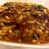 Hot and Sour Soup · The famous soup. Bean curd, sliced pork and fungus. Spicy.
