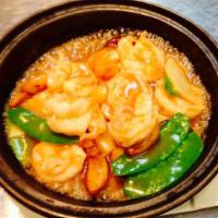 Garlic Shrimp Clay Pot · Jumbo shrimps cooked with whole garlic in a clay pot. For garlic lovers. 