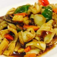 Black Bean Squid (mild hot) · Squid in a tangy black bean garlic sauce with onion, shallot and hot green pepper. Spicy.