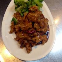 General Tso's Chicken (mild hot) · Chunks of chicken breast with our chef's special spicy brown sauce. Spicy.