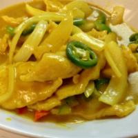 Curry Coconut Chicken (mild hot) · Sliced chicken simmered in coconut milk and stir-fried with exotic curry. Spicy.