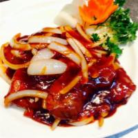 Cantonese Steak · Sauteed medallions of steak in a supreme sweet sauce with onion.