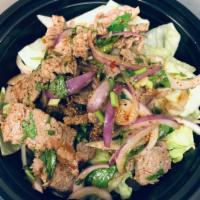Beef Salad · Flank steak, lettuce, cucumber, tomato tossed in tangy sweet and spicy sauce.