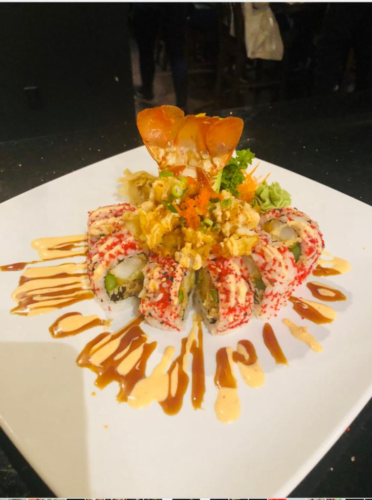 Lobster Roll · Lobster tempura, avocado, asparagus and tempura flake served with eel sauce.