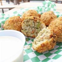Boudin Balls · Mouton's Signature Dish! Our homemade boudin battered and fried golden brown