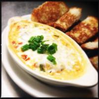 Crawfish Dip · Crawfish, bell pepper, onion, Mozzarella, and cream cheese served warm with French bread