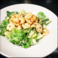 Cajun Shrimp Caesar Salad · Homemade Caesar vinaigrette tossed with romaine, fresh Parmesan cheese, French bread crouton...