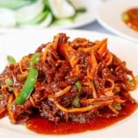 Dry Sauteed Shredded Crispy Beef · Shredded beef sauteed until crispy, served in a tangy spicy sauce. Hot and spicy.