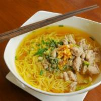 39. Mi Hai San · Seafood combo with shrimp, squid, imitation crab and fish meatballs egg noodle soup.