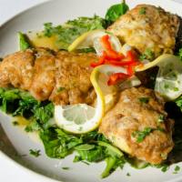 Chicken Francese · 3 - 5 oz. boneless breasts of chicken dipped in egg batter and sauteed in a lemon wine sauce...