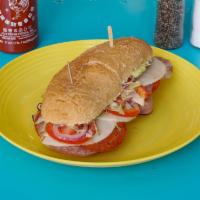 Deli-Stop Italian Sub · French roll filled with Genoa salami, ham, pepperoni and provolone cheese. Served hot or col...
