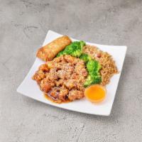 C21. Sesame Chicken · Served with egg roll and pork fried rice.