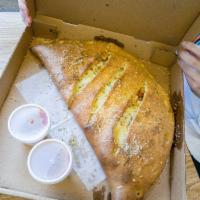 Italiano's 4 Cheese Calzone · Shredded Parmesan, mozzarella, American, ricotta. Add toppings for an additional charge.