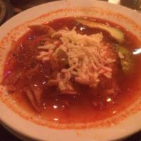 AZTECA · Tapatio's original tortilla chicken soup simmered with chipotle pepper and topped with queso...