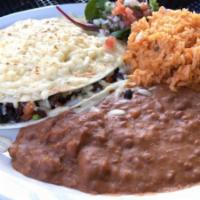 STEAK SINCRONIZADA · 2 flour tortillas stacked and stuffed with steak pico de gallo and beans topped with melted ...