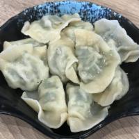 20. Leeks Dumpling with Pork  韭菜豬肉水餃 · 10 pieces. 