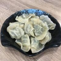 21. Napa Dumpling with Pork  白菜豬肉水餃 · 10 pieces.
