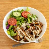 Chicken Kabob Bowl · Our house marinated chicken kabob, served on bed of Turkish rice with salad and tahini sauce.
