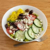 Greek Salad · Chopped romaine, shredded carrots and red cabbage, sweet peppers, tomatoes, cucumber, feta c...