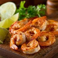 Shrimp Scampi · Grilled shrimp tossed in a garlic, buttery wine sauce.