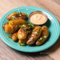 Fingerling Potatoes · Oven roasted fingerling potatoes, prepared with fresh herbs, extra virgin olive oil, and sav...