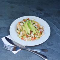 Ceviche · Shrimp cooked in lime juice, purple onion, tomatoes, cucumbers and cilantro.