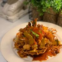 shrimp tamarind  · fried shrimp on crispy noodle with carrot ,onion ,red onion , bell pepper , cashew nut, scal...