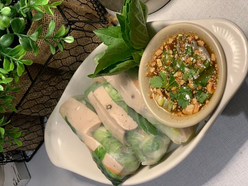 Vietnamese fresh roll · grill pork  with mix vegetable , vermicelli noodle, basil , in rice paper wrap come with spicy peanut sauce