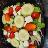 Greek Salad · Romaine lettuce, Feta cheese, cucumbers, red onions  and Kalamata olives top off this scrump...