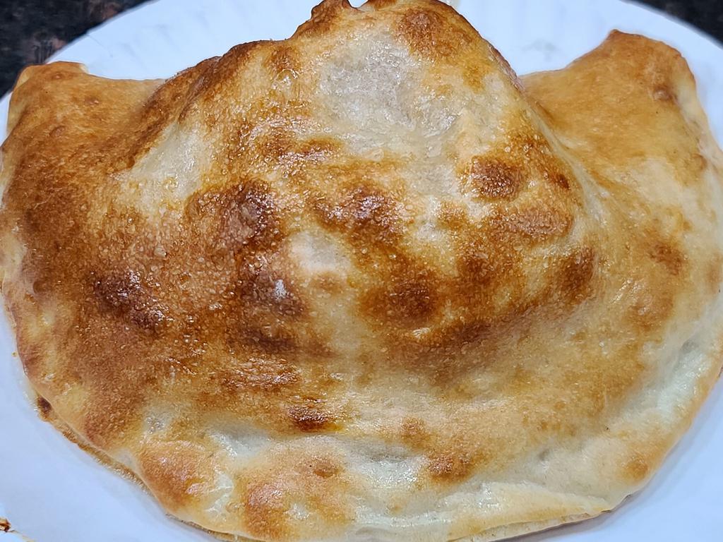 Cheese Calzone · Made with Ricotta, Romano, and Mozzarella cheeses. 