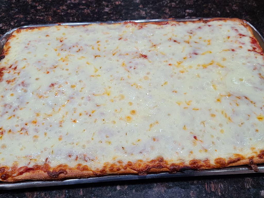 Cheese Sicilian Pie · Fresh gooey Mozzarella cheese on a thicker crust. Traditional square fave!