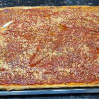 Marinara Pizza Sicilian Pie · Our delicious upside down square with Mozzarella cheese underneath and our famous marinara s...