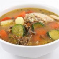 Caldo de Pollo · Freshly prepared chicken soup with fresh vegetables, served with a side of Mexican rice and ...