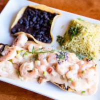 Pollo Costeño · Grilled chicken breast topped with specialty sauteed seasoned cream shrimp. Served with Mexi...