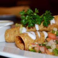 Flautas · 3 tightly rolled, flute shaped corn tortillas filled with chicken and topped with tomatoes, ...