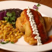 Chiles Rellenos · 2 poblano peppers lightly egg battered and pan fried. The peppers are the stuffed with chihu...