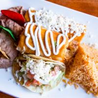 Mexican Combo · Beef mini chimichanga, chicken taco, and a cheese enchilada. Served with Mexican rice and pi...