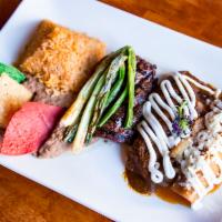 El Mariachi Combo · Grilled skirt steak, chicken flauta, chile relleno, Mexican rice and refried pinto beans.