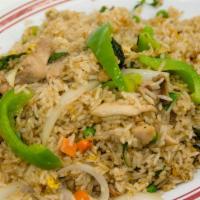 26. Basil Fried Rice Chicken · Served with egg, onion, bell pepper, peas, carrots, chili and basil.