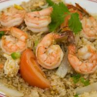 28a. Thai Fried Rice Shrimps · Served with egg, onion, tomatoes, peas and carrots.