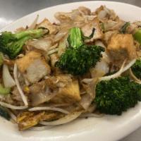 42. Vegetarian Pad Kee Mow · Fresh, flat rice noodles stir-fried with tofu, broccoli, onion, bell pepper, bean sprouts, b...