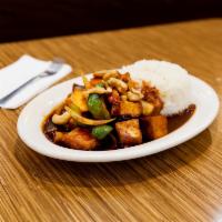 43. Cashew Nut Tofu · Sauteed with mushroom, onion, bell pepper, carrots and roasted sweet chili paste. Spicy.
