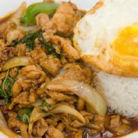 54. Basil Chili Chicken and Fried Egg · Sauteed with bell pepper, onion, basil in garlic sauce. Spicy.