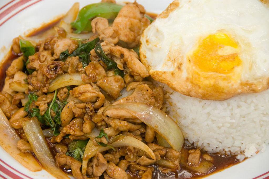 54. Basil Chili Chicken and Fried Egg · Sauteed with bell pepper, onion, basil in garlic sauce. Spicy.