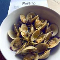 Clams Bianco · Clams (Wellfleet, MA) simmered in white wine, garlic, chili flakes, parsley, butter, house m...