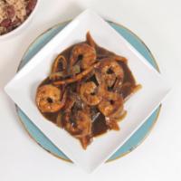 Jerk Shrimp · Shrimp sauteed with onions and peppers in jerk sauce. Served with a rice and peas, white ric...