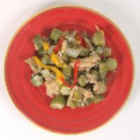 Salt Fish with Okra · Saltfish and okra sauteed with onions, tomatoes and peppers. Served with a rice and peas, wh...