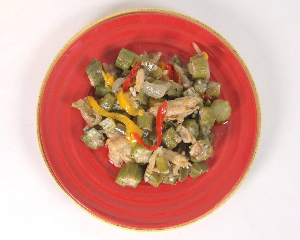 Salt Fish with Okra · Saltfish and okra sauteed with onions, tomatoes and peppers. Served with a rice and peas, white rice or yellow rice and 1 choice of macaroni and cheese, a garden salad, sauteed cabbage carrots, potato salad, candid yams, or collard greens.